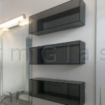 Grey Glass Cabinets with Grey Mirror Back