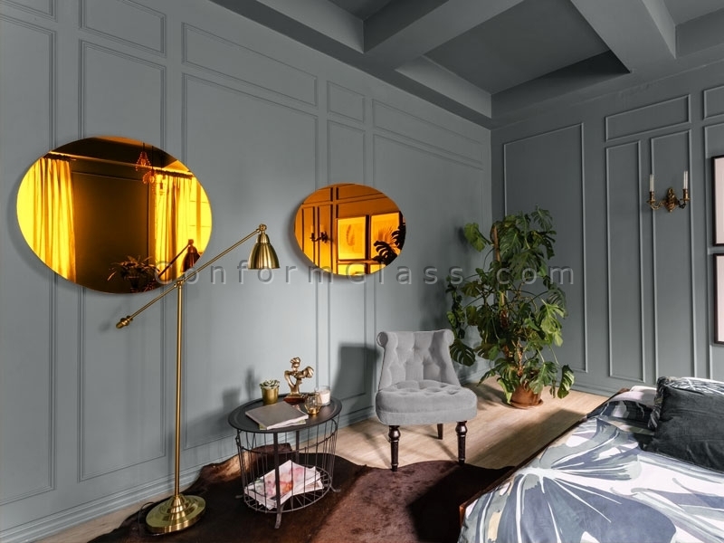 Two Oval Gold Mirrors in Hotel Room